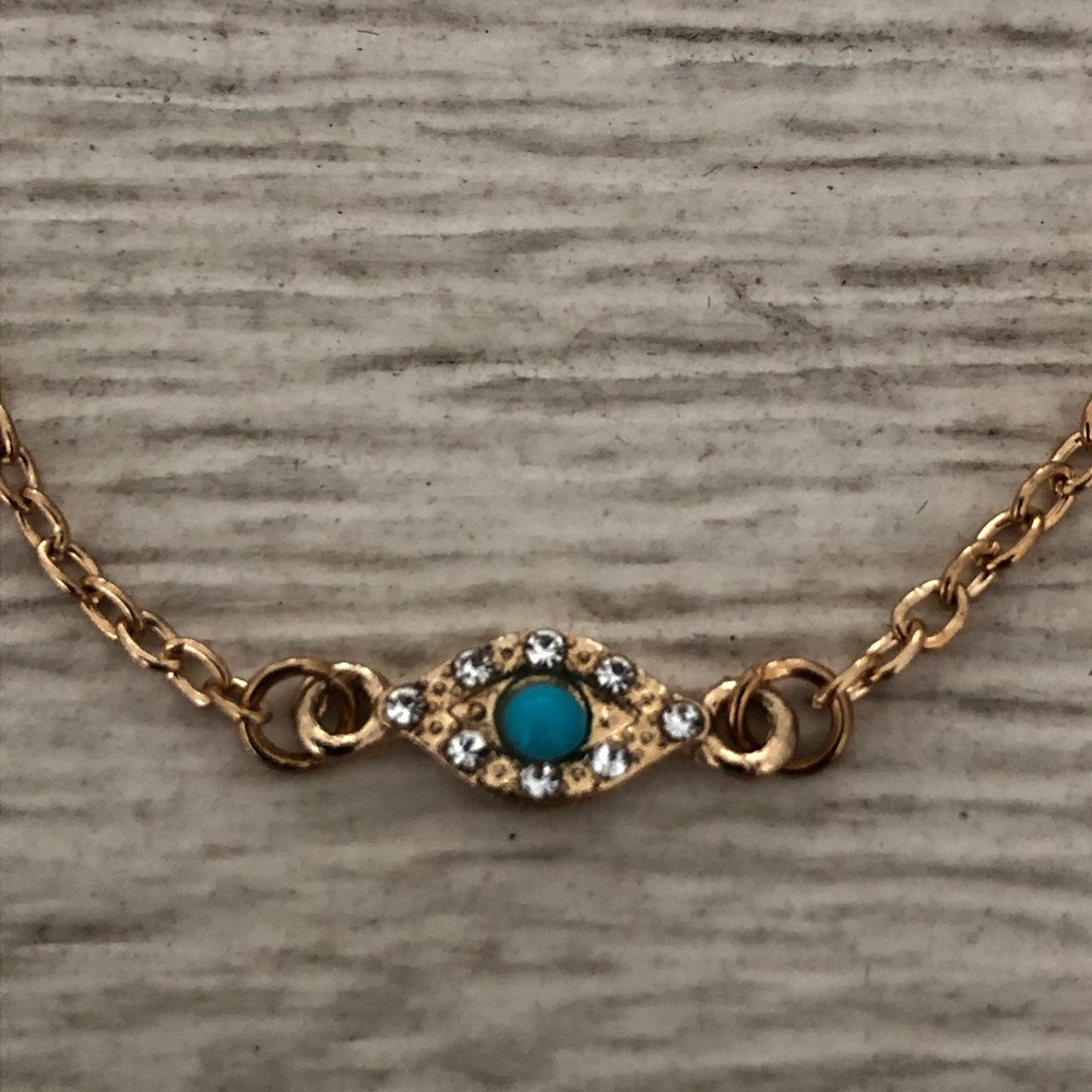 Evil eye gold tone bracelet